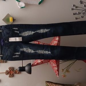 Destroyed dark rinse skinny jeans